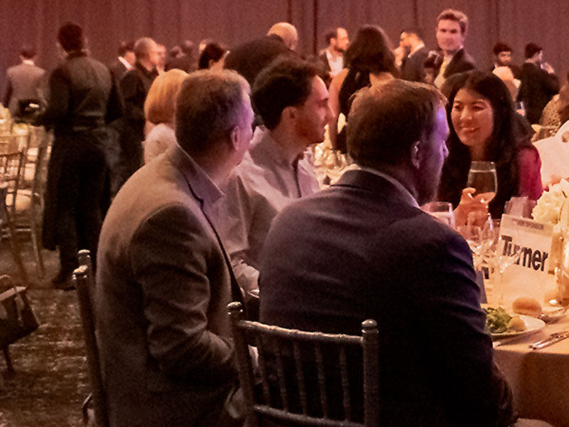 Faulty and industry members share a table at the BC Banquet.
