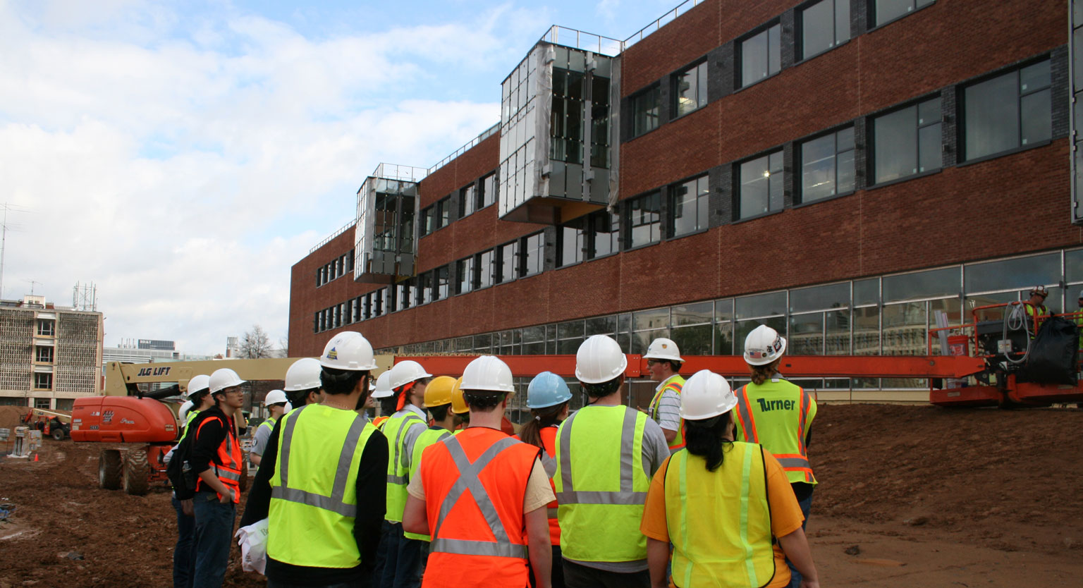Students at site visit during Clough construction. 