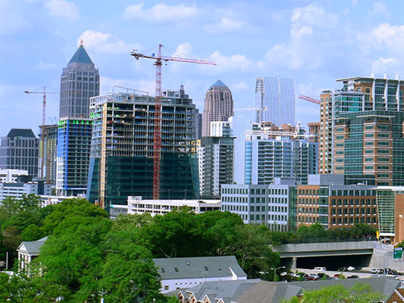 Atlanta skyline with construction cranes.
