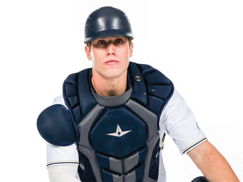 Rubenstein in a baseball catcher's uniform.