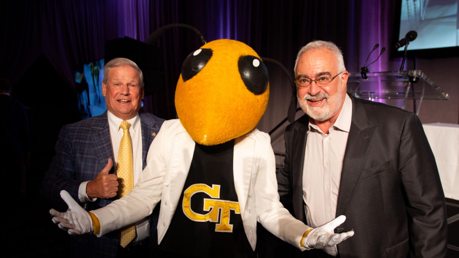 Building Construction industry leaders posing with Buzz.