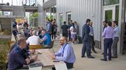 Attendees gathered on the Exhibition Hall patio to relax and talk.
